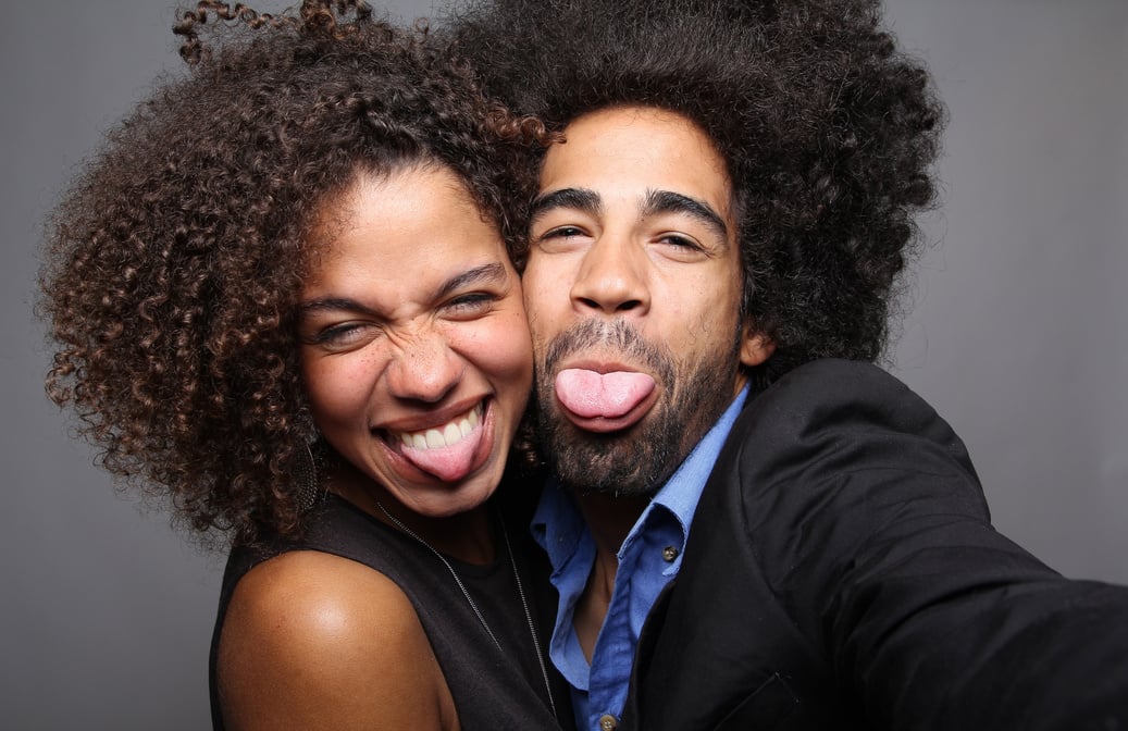 Happy love couple in a Photo Booth