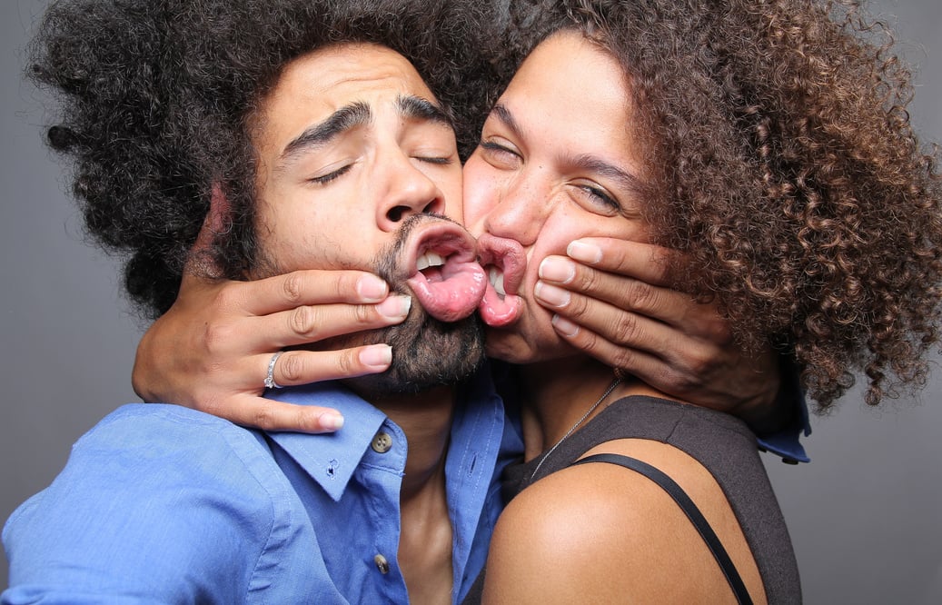 Happy love couple in a Photo Booth