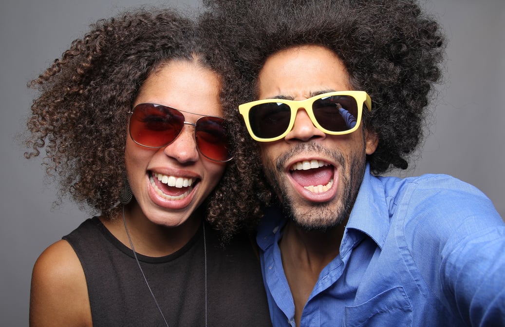 Happy love couple in a Photo Booth